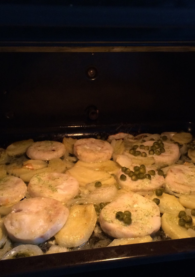 Una foto de Merluza al horno en salsa