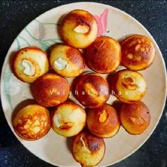 Karnataka style sweet appe (sihi goliyappam) A picture of Karnataka style sweet appe (sihi goliyappam).