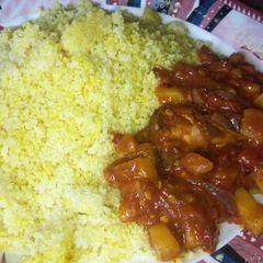 A picture of Curry cous cous with Irish potatoes sauce.