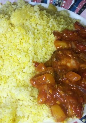 A picture of Curry cous cous with Irish potatoes sauce.