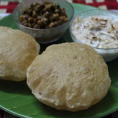 A picture of Navaratri Special Thali(Puri,Kale Chane,Sevai Kheer).