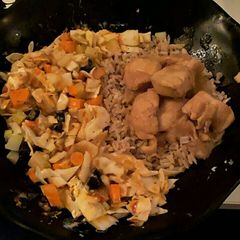 A picture of Rice with veggies.