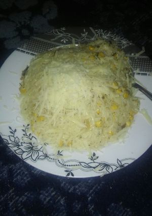 Una foto de Arroz con crema choclo y cebolla