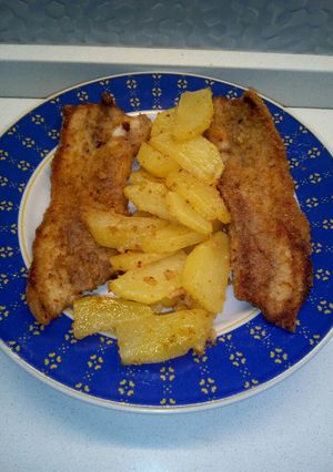 Foto di Puntine di maiale con patate aromatizzate al forno