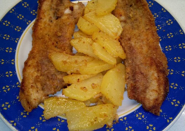 Puntine di maiale con patate aromatizzate al forno