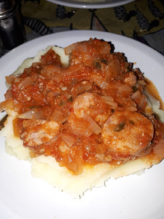 Una foto de Chorizos a la pomarola c puré