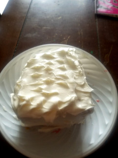 Una foto de Torta de naranja con relleno de fresas