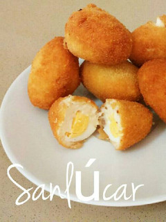 Una foto de Huevos rellenos de bechamel