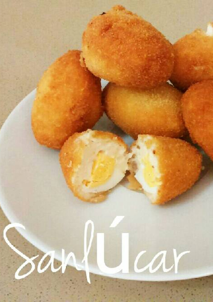 Una foto de Huevos rellenos de bechamel