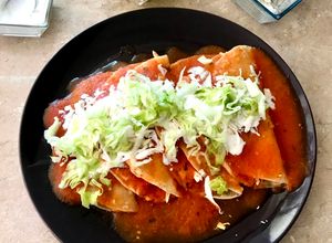 Una foto de Entomatadas de pollo