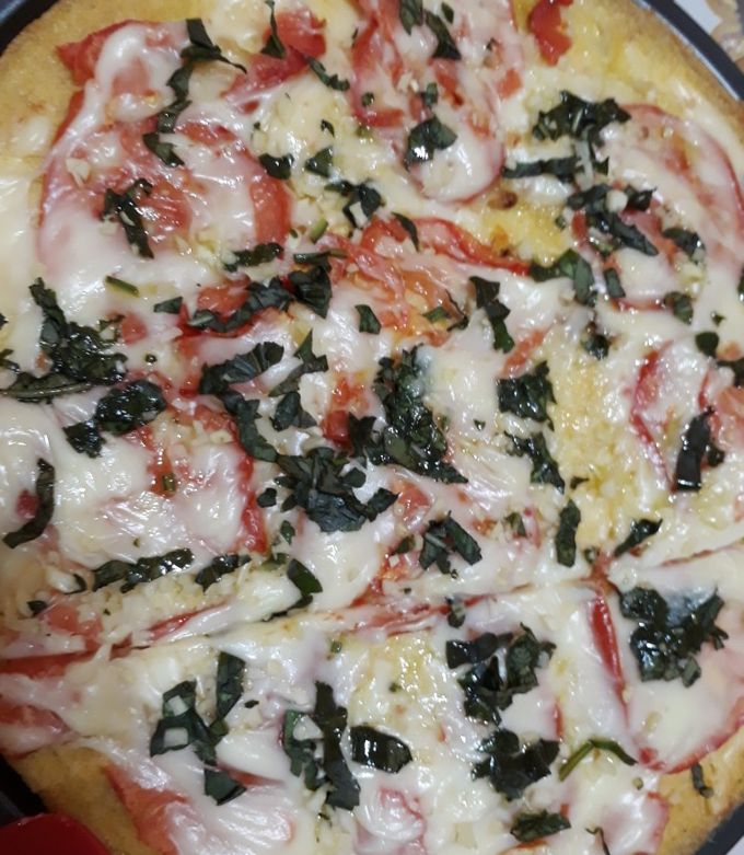 Una foto de Pizza de polenta