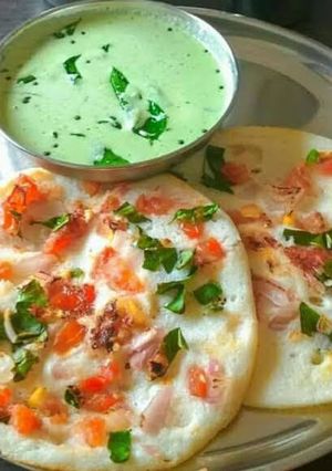 A picture of Onion and tomato Uttapam.