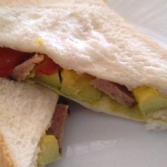 A picture of Sausage avocado sandwich.