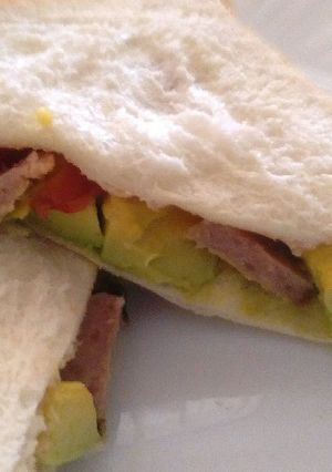A picture of Sausage avocado sandwich.