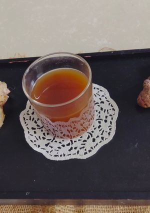 A picture of Raw turmeric and Ginger kaadha.