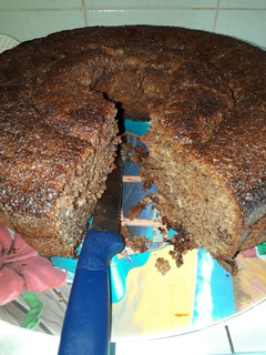 Una foto de Budín de chocolate con chispas 🥧👌☕!!!