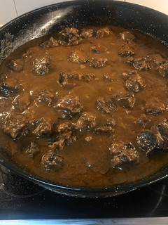 Una foto de Rabo de toro de lidia al vino tinto