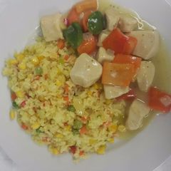 Chicken ala king with vegetable fried rice A picture of Chicken ala king with vegetable fried rice.