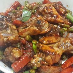 A picture of Honey glazed chicken with parboiled vegetables.