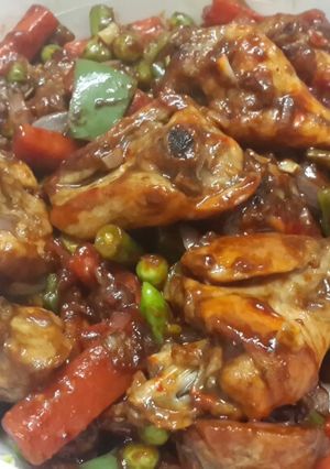 A picture of Honey glazed chicken with parboiled vegetables.