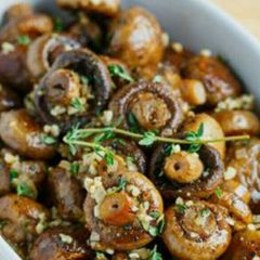 A picture of ROASTED mushrooms in brown butter.