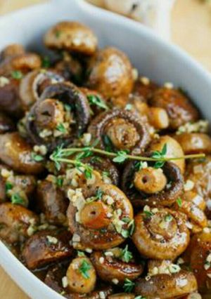 A picture of ROASTED mushrooms in brown butter.