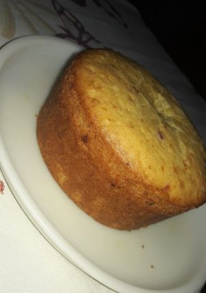 A picture of Eggless tutti frutti cake in cooker.