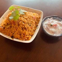A picture of Little Millet (Saamai Arisi) Tomato Rice.