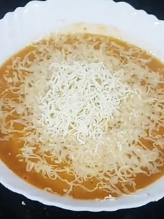 A picture of Apple carrot soup.