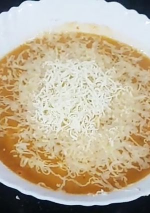 A picture of Apple carrot soup.