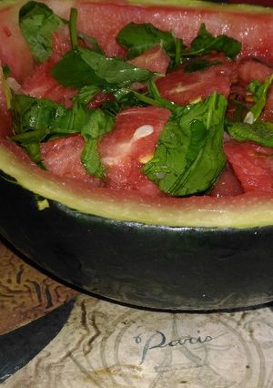 A picture of Watermelon and spinach salad.