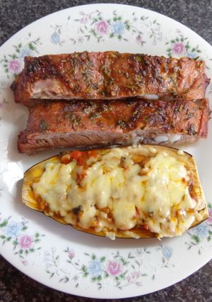Una foto de COSTILLAR AL MERKÉN.BERENJENA HORNEADA RELLENA CON CHAMPIÑONES. JON STYLE