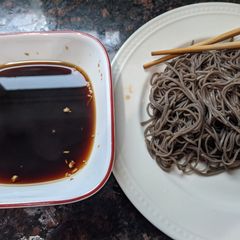 A picture of Cold soba with dipping sauce.