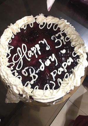 A picture of 37 years of love blueberry cheesecake.