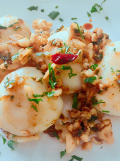 Una foto de Sepia plancha con vino y salsa de ostras