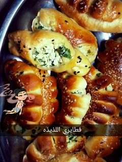 صورة لوصفة فطاير بالجبنه والبقدونس