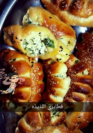 صورة لوصفة فطاير بالجبنه والبقدونس