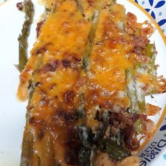 A picture of Cheesy Asparagus in a Cast Iron Skillet.