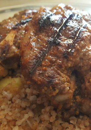 A picture of Ahmed’s Grilled Lamb Chops with Pineapple Bulgur.
