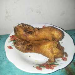 A picture of Kepala Ayam goreng bumbu kuning.