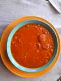 Garbanzos con crema de zapallo y tomate