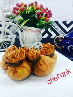 A picture of Money💰Bag (Potil Samosa).