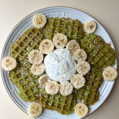 A picture of Vietnamese Pandan Coconut Waffles (bánh kẹp lá dứa).