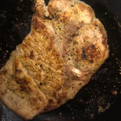 A picture of Garlic ranch pork steaks.