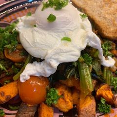 Vegetarian Friendly: Harrisa Spinach Roasted Sweet Potatoes A picture of Vegetarian Friendly: Harrisa Spinach Roasted Sweet Potatoes.