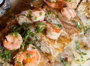 Foto de Lombos de peixe com camarão e molho cremoso