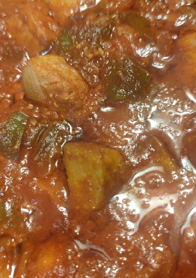 Una foto de Atún con tomate y pimientos