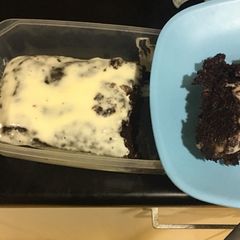 Super moist banana chocolate cake with sour creme dressing A picture of Super moist banana chocolate cake with sour creme dressing.