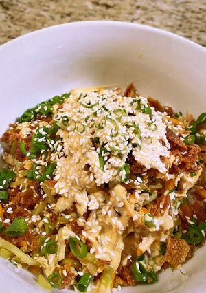 A picture of Egg-roll in a bowl.