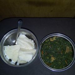 Sukumawiki and spinanch with meat A picture of Sukumawiki and spinanch with meat.